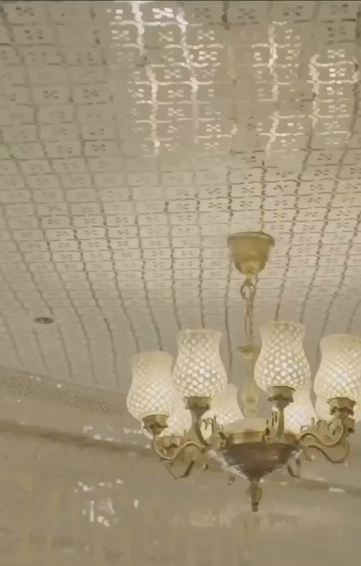Mirror-work ceiling and chandelier at The Royal Jharokha